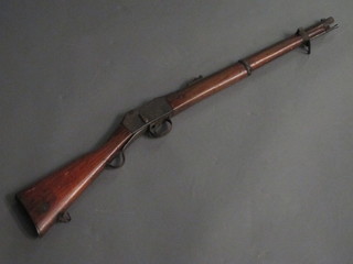 A Martini Henry carbine rifle complete with cleaning rod   ILLUSTRATED