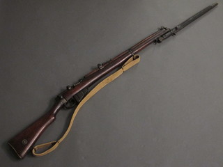 A Lee Enfield S.M.L.E slim rifle complete with bayonet and de-activation certificate  ILLUSTRATED