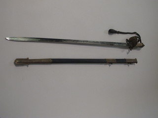 A 19th/20th Century naval officer's sword by J R Gaunt  complete with dress knot and scabbard, see also lots 473 and medals 955  ILLUSTRATED