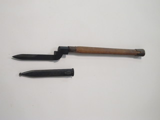 A pig stick bayonet mounted on a wooden shaft