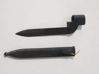 A pig stick bayonet complete with metal scabbard