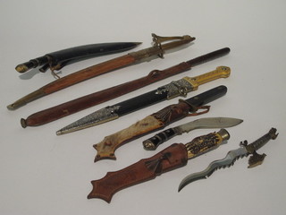 8 various reproduction daggers