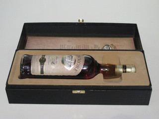 A bottle of 25 year old Bowmore whisky