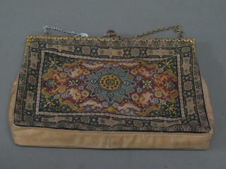 A lady's evening bag with gilt metal mount