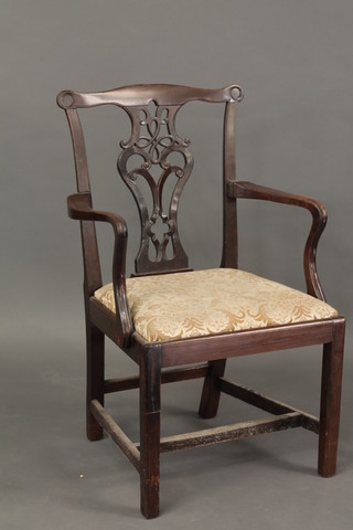 A 19th Century Chippendale style mahogany carver chair with  pierced slat back and upholstered drop in seat