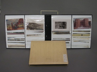 A yellow album of 50 postcards and a black album of 60  postcards