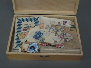 A small wooden box containing stamps