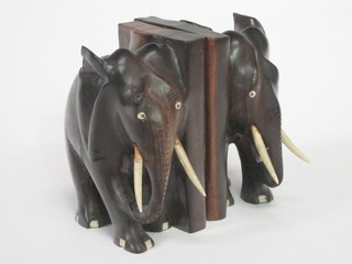 A pair of carved Eastern bookends in the form of elephants 7"