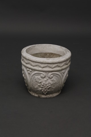 A circular white painted urn, the body with grap and zig zag  decoration 12"