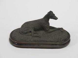 A bronzed figure of a greyhound 7"