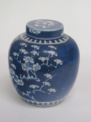 An Oriental blue and white ginger jar and cover, the base with 6 character mark, lid f and r, 9"
