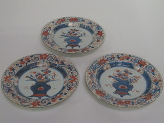 3 18th/19th Century Japanese Imari porcelain plates decorated  urns and flowers 9", 1 f and r,