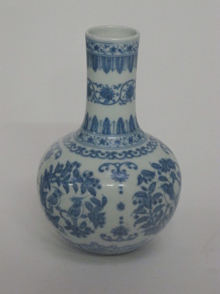 An Oriental blue and white club shaped vase, the base with seal  mark 7"  ILLUSTRATED