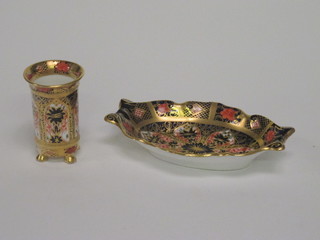 A boat shaped Royal Crown Derby porcelain pin tray 5 1/2" and  a cylindrical Royal Crown Derby vase XXVIII 2 1/2"