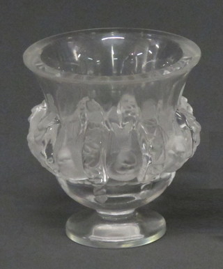 A Lalique bell shaped pedestal vase decorated birds, raised on a circular spreading foot, base signed Lalique France, 5"   ILLUSTRATED