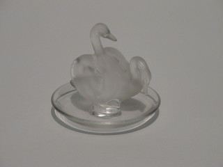 A Lalique circular pin dish decorated 2 swans 3 1/2", the base  signed Lalique France  ILLUSTRATED