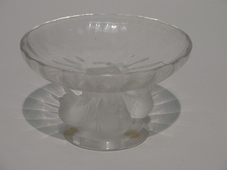 A Lalique circular pedestal bowl supported by four birds and raised on a spreading base 5 1/2"  ILLUSTRATED