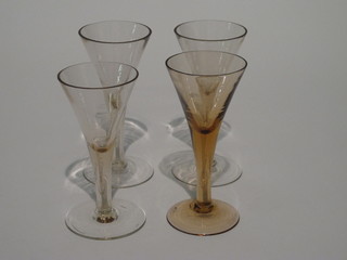 4 Georgian style trumpet shaped glasses 7", chips to rim,