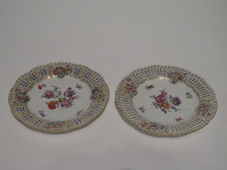A pair of 19th Century Continental porcelain ribbon ware plates  with floral decoration 8"