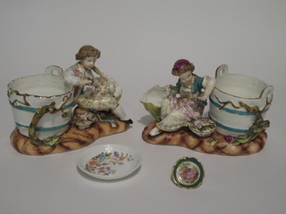 A pair of Continental porcelain vases in the form of pails  supported by figures of boy and girl, f and r, 8" together with an  Aynsley circular dish 4" and a Limoges miniature plate 2"