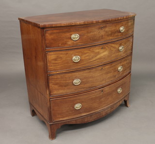 A Georgian mahogany bow front chest of 4 long drawers with  brass drop handles, raised on splayed bracket feet 39"   ILLUSTRATED