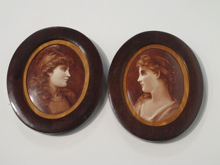 A pair of porcelain plaques head and shoulders portraits of ladies  7", oval