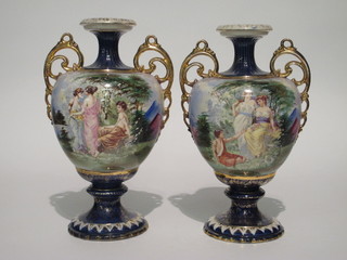 A pair of Edwardian Continental pottery twin handled vases  decorated figures of ladies 14"