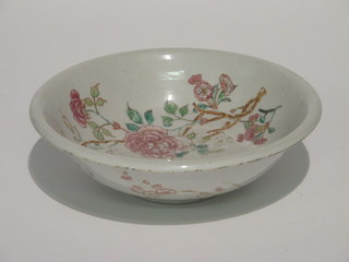 A circular Oriental porcelain bowl with floral decoration 11"