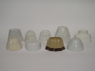 A collection of 9 jelly moulds