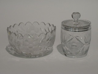 A circular cut glass bowl 8" and a cut glass biscuit barrel 5"