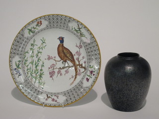 A black glazed Poole Pottery vase 6" together with a Royal  Worcester plate decorated a cock pheasant 10"