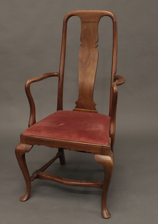 A Queen Anne style walnut slat back carver chair with drop in  seat and H framed stretcher