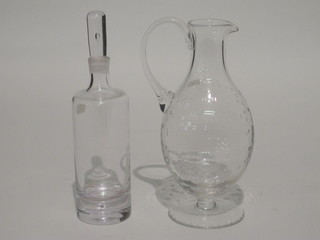 A glass ewer 12" and a club shaped decanter and stopper