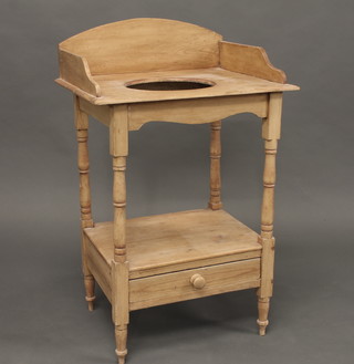 A 19th Century pine wash stand with three-quarter gallery and  bowl receptical, raised on turned supports the base fitted a drawer  22"