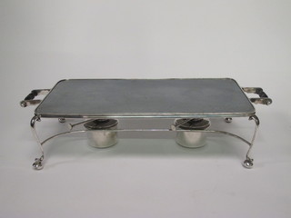 A rectangular silver plated hot plate complete with burners 17"  and pair of oval silver plated entree dishes and covers with bead  work borders