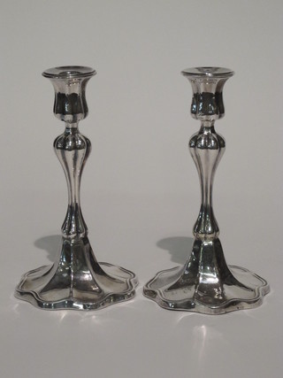 A handsome pair of Art Nouveau silver plated candlesticks, the  bases marked BMF 8 1/2"