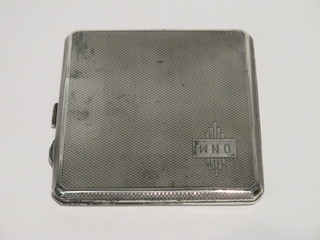 A silver cigarette case with engine turned decoration Birmingham 1937, 3 ozs