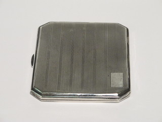 A silver cigarette case with engine turned decoration Birmingham 1929, 3 1/2 ozs