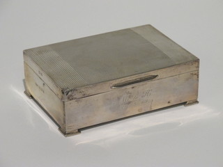 A silver cigarette box with engine turned decoration, Birmingham 1961 5"