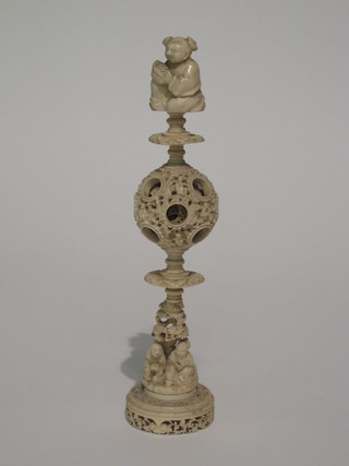 A carved ivory puzzle ball on stand 9"  ILLUSTRATED