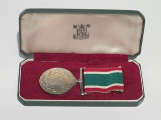A Women's Voluntary Service Long Service medal, cased