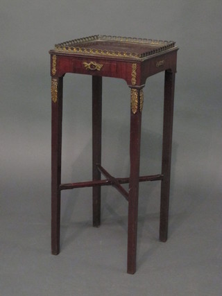 A Georgian mahogany urn table with brass three-quarter gallery, fitted a cup slide, raised on square tapering supports with X  framed stretcher 13"
