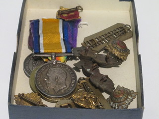 2 pairs comprising British War medal and Victory medal to  30700 Pte. J T Rowley Cheshire Regt. and 293049 Pte. A Wroe  Cheshire Regt. and 2 Royal Army Service Corps metal shoulder  titles and a small collection of pips etc