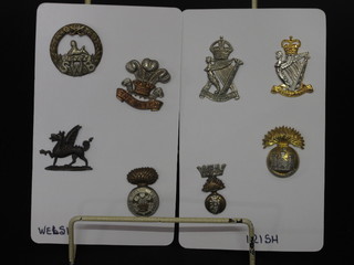 15 cap badges including Brigade of Guards and Light Infantry Brigades, on 2 cardboard sheets