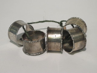 4 silver napkin rings Birmingham 1906 and 1 other, 3 ozs