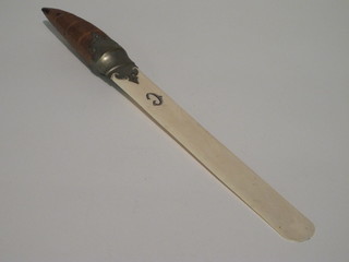 A Victorian ivory bladed newspaper opener with crocodile skin  covered handle 12"