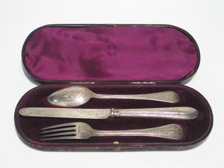 A Victorian 3 piece silver christening set comprising knife, fork and spoon with engraved decoration London 1879, cased