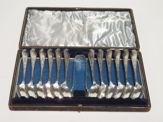 A set of 12 Art Deco Scots silver teaspoons, Edinburgh 1928  together with matching tongs, 7 ozs