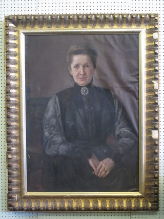 A Victorian oil on board "Portrait of a Victorian seated Lady"  33" x 24", contained in a gilt frame