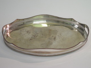 An oval silver plated galleried tea tray 18"